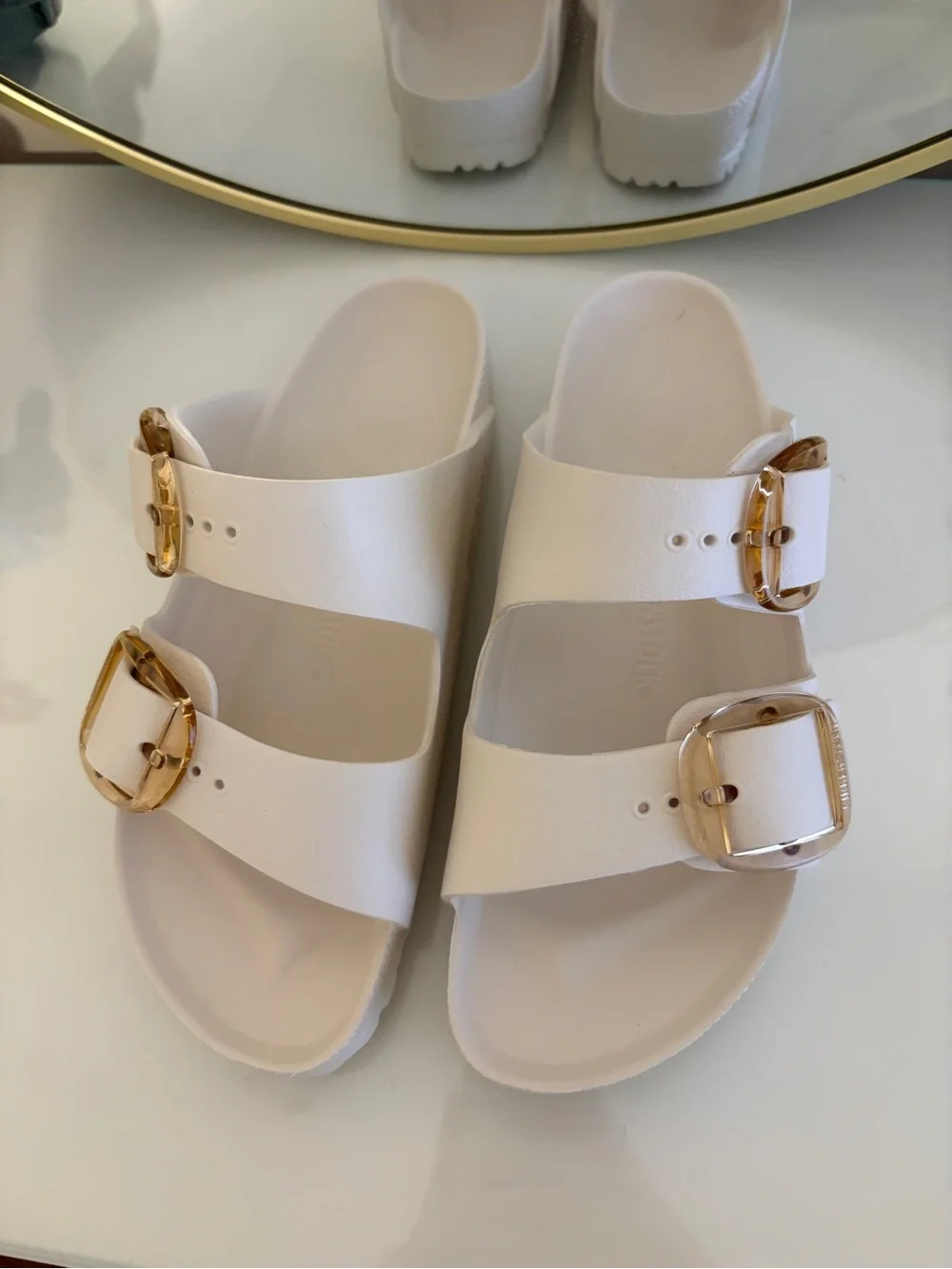 White Birkenstock Double Buckle Slide Sandals with Gold Hardware - Picture 1 of 3